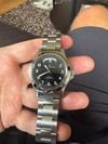 Customer picture of Hamilton Khaki Field King Day-Date automaat (40 mm) met zwarte wijzerplaat met zonnestraalmotief / roestvrijstalen armband H64475131