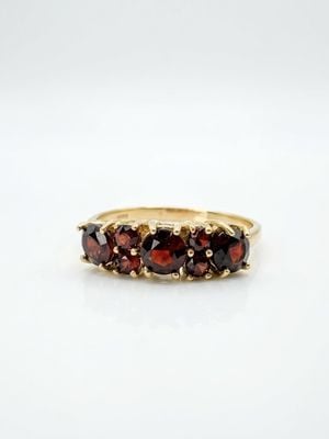 James Moore & Co Pre-Owned 7 Garnet Stone 18ct Yellow Gold Half Hoop Ring J74261