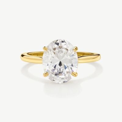 D.LOUISE Gold Tone White Stone Travel Ring